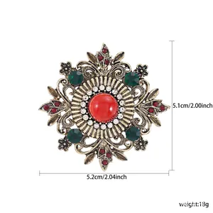 Detailed size measurements of vintage ornate antique gold brooch pin with red stone