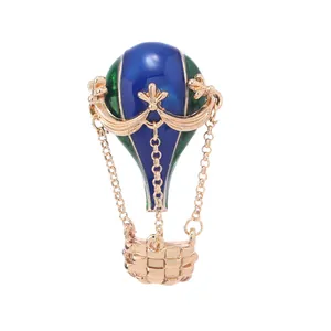 Eleganter Vintage-Heißluftballon-Brosche mit blauer und grüner Emailleglasur in Goldoptik