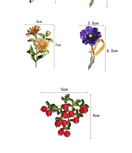 Detailed dimensions for elegant gold floral, purple anemone, and red berry cluster brooches