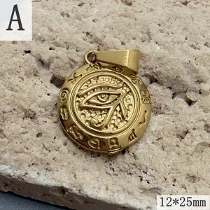 Detailed view of a gold Eye of Horus stainless steel pendant on stone background.