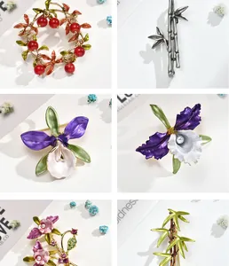 Collage of detailed enamel flower and bamboo brooches with rhinestones and pearls.