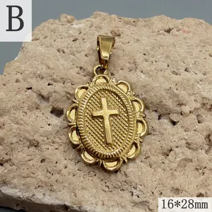 Detailed macro view of vintage gold stainless steel cross pendant, size 16x28mm.