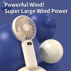 Modern portable handheld mini fan in beige with digital wind speed display screen