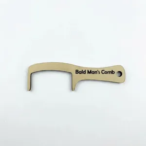 Funny wooden bald man's comb novelty joke gift for men with engraved text on white background