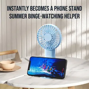 Blue portable mini USB rechargeable handheld fan with integrated phone holder stand
