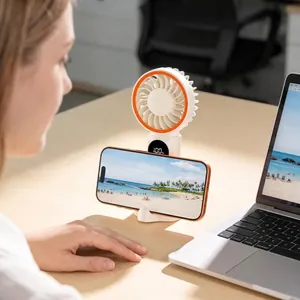 Portable USB rechargeable desk fan with digital display and integrated smartphone holder stand