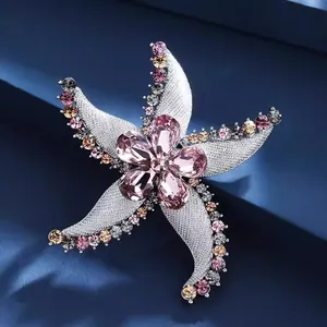 Luxuriöse Seestern-Brosche mit rosa Kristallen und Strasssteinen für elegante Damenmode