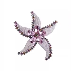 Eleganter Seestern-Brosche mit lila Kristallen für Damen, luxuriöses Modeaccessoire Schmuck.