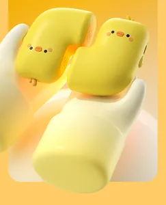 Detailed view of the cute duck-shaped magnetic hand warmer with smooth matte texture
