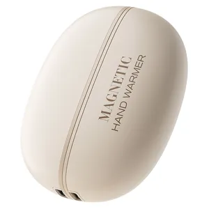 Scaldamani magnetico portatile ricaricabile tramite USB in un elegante tono beige