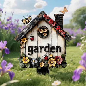 Decorative vintage style garden birdhouse stake featuring floral patterns and ladybug accents
