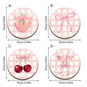 Set of pink checkered wooden coasters featuring cute strawberry and cherry illustrations
