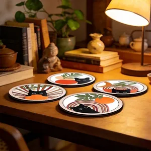 Sottobicchieri artistici isolanti con disegni di gatti neri e frutta
