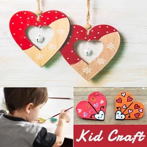 Kid painting heart-shaped wooden craft pieces for creative DIY holiday decorations