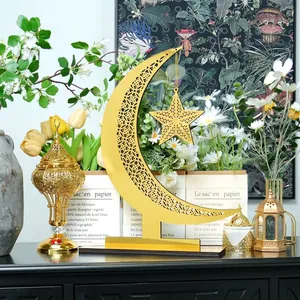 Elegant golden hollowed-out moon and star metal stand for home festive decoration
