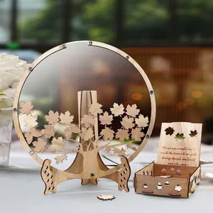 Wooden tree-shaped wedding guest book with maple leaf drops and keepsake box