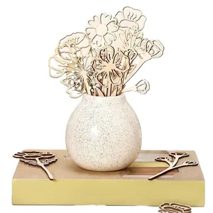 Handcrafted laser-cut wooden wildflowers in a ceramic vase for rustic home decor