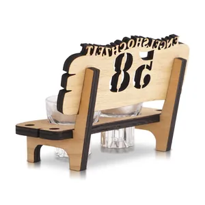 Back view of creative wooden bench shot glass holder with laser-cut anniversary 50th design