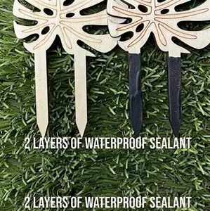Macro detail of waterproof sealant layers on wooden monstera leaf plant stakes