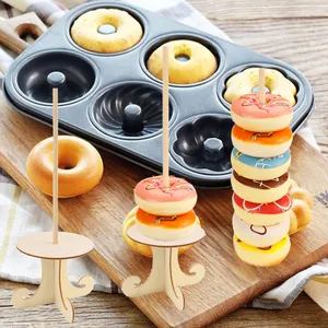 Detailed view of handmade wooden donut stands for wedding party and birthday decorations.