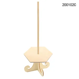 Detailed view of natural wooden donut stand with hexagonal base for party decor