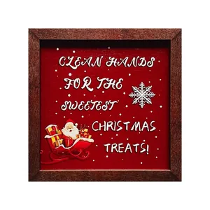Festive wooden Christmas photo frame with Santa Claus illustration and sweet holiday quote