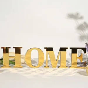 Elegante gouden spiegel acryl HOME letters voor wand- of bureau decoratie in huis