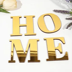 Gouden spiegel acryl letters HOME voor moderne interieur wanddecoratie en huisstijl inrichting