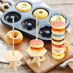 Hexagonal wooden donut display stand for party decorations and dessert table display.