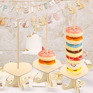 Heart-shaped wooden donut display stand with vertical rod for birthday party table decoration