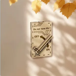 Detail of novelty wooden switch plate with 'Do not turn ON' text and lever