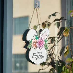 Suspension de porte lapin de Pâques en bois avec décor floral et message Joyeuses Pâques