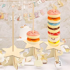 Detailed macro view of star-shaped wooden donut stands for birthday party decorations