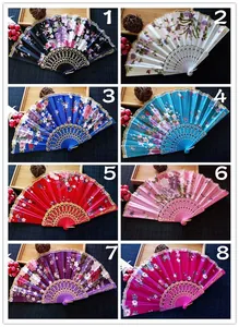 Collage of 8 colorful floral satin folding fans with plastic bones and lace trim