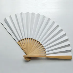 Detail of a 9-inch white blank folding fan showing natural bamboo ribs structure