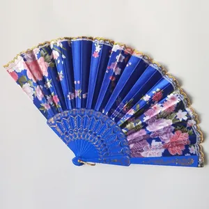 Elegant blue satin folding fan with pink floral patterns and gold lace edge detail