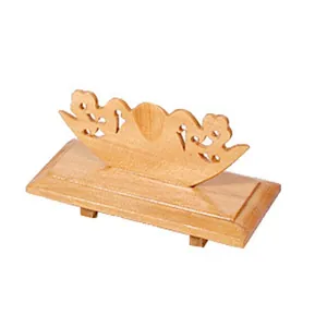 Detail view of natural bamboo fan display stand with carved decorative pattern