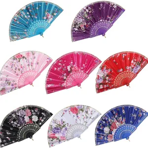 Set of 8 colorful floral satin folding fans with lace edges and plastic bones.