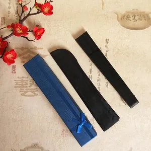 Handcrafted black bamboo folding fan set with protective sleeve and blue ribbon gift box