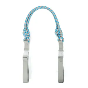 Detailed view of grey and blue braided nylon shoulder strap with plastic buckles