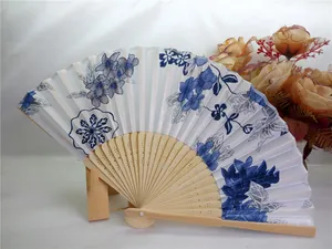 Traditional 21cm bamboo folding fan with blue floral pattern on white background