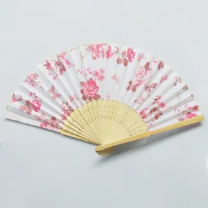Full view of elegant floral silk folding fan with bamboo ribs and pink rose print