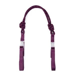 Detail of purple nylon extension strap for shopping bags with buckles.