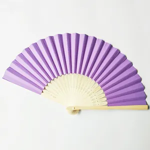 Detailed view of a blank purple paper folding fan perfect for wedding DIY crafts