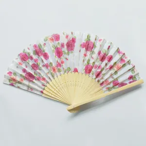 Elegant pink rose floral print folding hand fan with natural light bamboo frame detail