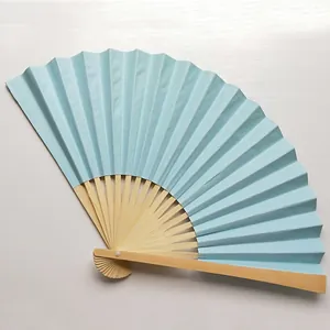 Detail view of a 9-inch candy-colored blue folding fan with natural bamboo ribs.