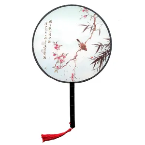 Exquisite traditional Chinese round hand fan with bird and flower painting and red tassel