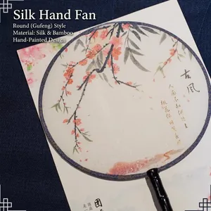 Handcrafted traditional Chinese style circular fan with elegant peach blossom pattern print