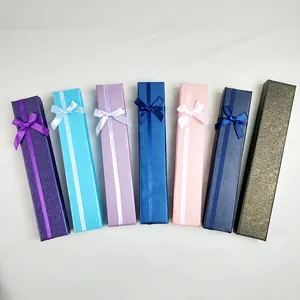 Collection de boîtes à bijoux longues avec nœuds en ruban de couleurs élégantes