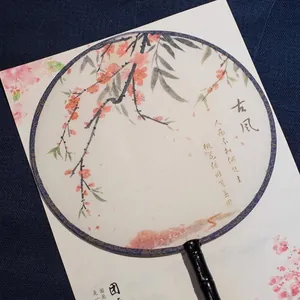 Elegant traditional Chinese silk round fan with pink peach blossom and calligraphy design